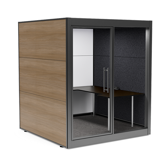 Work Plus office pod with desk and door in stand alone modular office, wood wall panels and black frame.